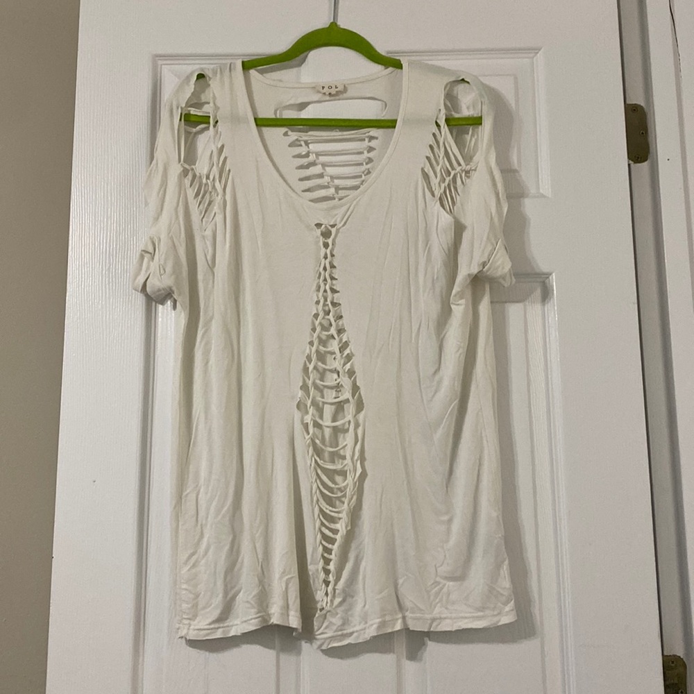 White completely cut shirt